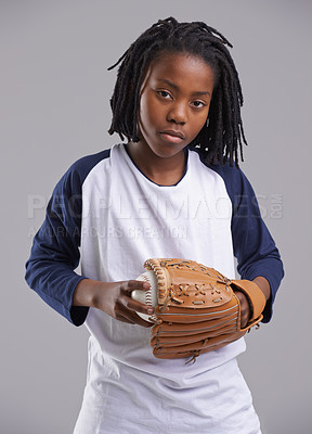 Buy stock photo Studio shot of a young boy with baseball gear