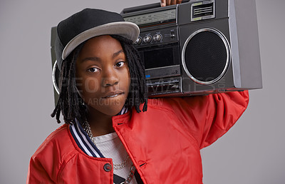 Buy stock photo Black child, confidence and portrait with radio for hip hop, rap and swag dance with cool clothes in studio. Youth, teen clothing and boombox with urban style and fashion and kid with grey background