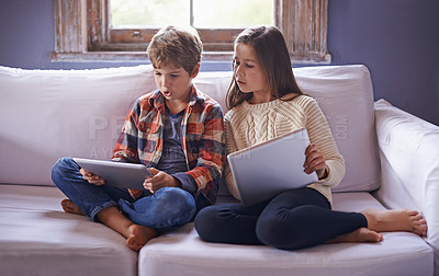 Buy stock photo Boy, girl and tablet for gaming on couch together, technology and online streaming for bonding at home. Digital 
world, internet with kids or sibling in living room, gamer app or elearning with ebook