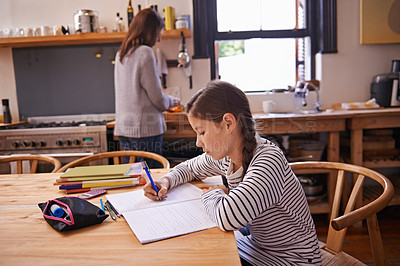 Buy stock photo Girl, kid and homework with studying in kitchen with writing, development or notes for education in house. Child, notebook and thinking with learning, language and ideas for assessment in family home