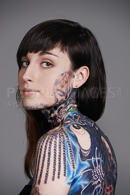 Buy stock photo Woman, tattoo and portrait for creative, ink and design for picture and symbol for blue and colourful. Young person with art for bold, cool and statement for funky, trendy and unique for edgy