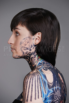 Buy stock photo Woman, tattoo and ink for creative, body and design for picture and symbol for blue and colourful. Young person and look with art for bold, cool and statement for funky, trendy and unique for edgy