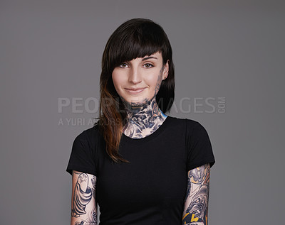 Buy stock photo Happy woman, portrait and tattoo with fashion for facial treatment, style or body art on a gray studio background. Female person, young model or smile for design, creativity or cool beauty artist