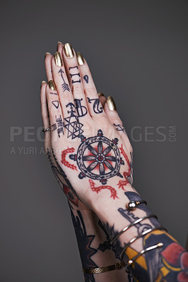 Buy stock photo A cropped shot of tattooed hands