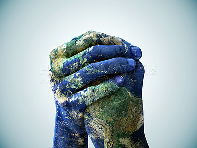 Buy stock photo A cropped shot of hands painted to look like the earth