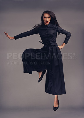 Buy stock photo Portrait, woman and martial arts training, focus and female isolated on studio background. Lady, girl and ninja with traditional outfit, fitness and workout for practice, warrior and character in air
