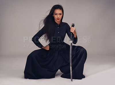 Buy stock photo Samurai portrait, sword and asian woman warrior, ninja or fighter focus on fight for power, cosplay and fantasy. Asian female from Japan in black fashion with beauty, action and weapon for art deco