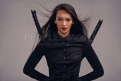 Buy stock photo Ninja, swords and portrait of a woman in studio with a warrior assassin outfit for martial arts. Fantasy, cosplay and Japanese female model in samurai costume with blade isolated by gray background.