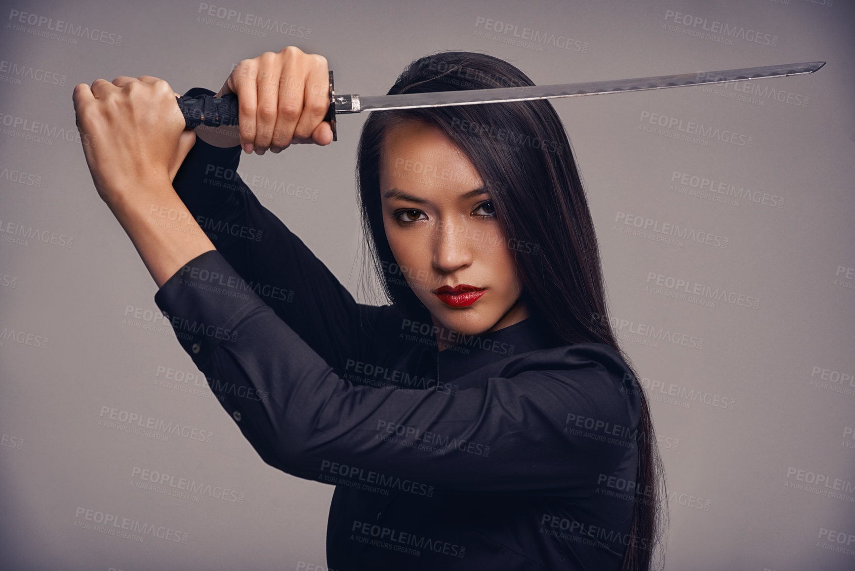 Buy stock photo Portrait, sword and ninja with a model woman in studio on a gray background for martial arts or combat. Training, fantasy and weapon with an asian samurai ready to defend using self discipline