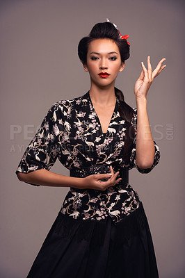 Buy stock photo Fashion, art portrait and Japanese woman with confidence and Asian clothing with traditional outfit in studio. Culture, creative and heritage clothes with person from Japan and brown background