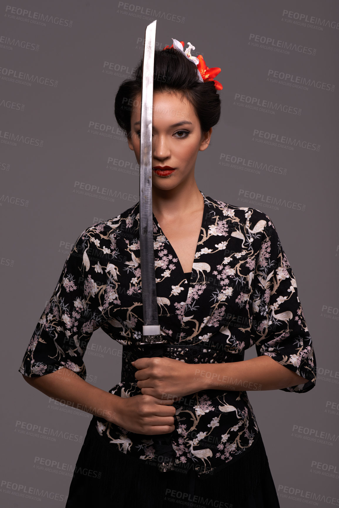 Buy stock photo Asian woman, fashion and sword in studio on confidence with grey background, traditional style and elegant. Portrait, Japanese and female person with designer, fashion and outfit for heritage 