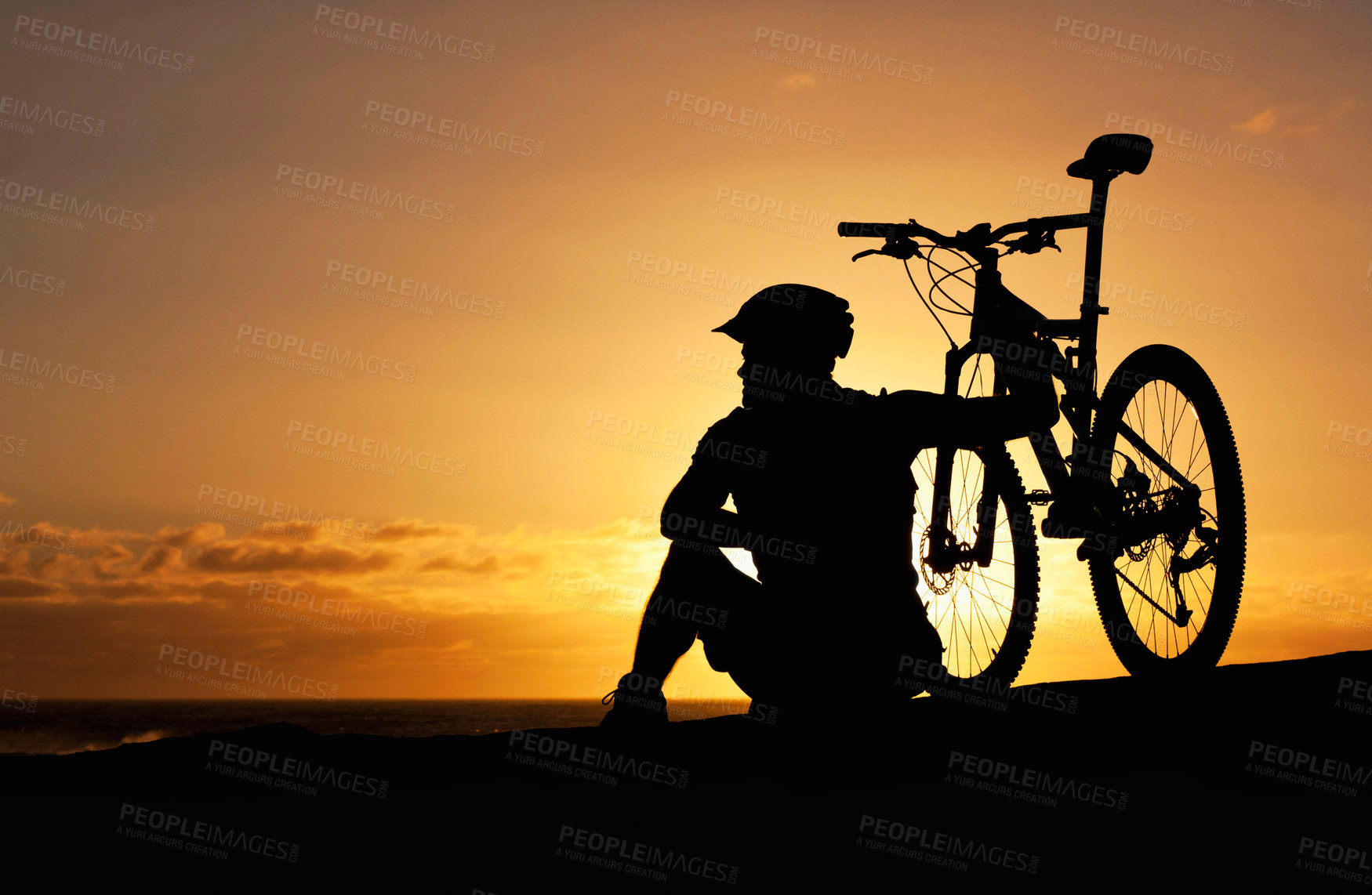 Buy stock photo Sunset, silhouette and bike with man at beach for relax, fitness and vacation trip. Travel, cycling and sky mockup with male cyclist and bicycle on coastline for training, peace and sports hobby