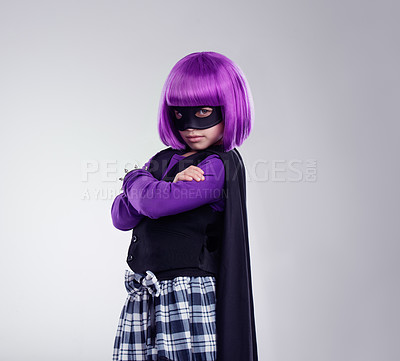 Buy stock photo Portrait, girl and mask for costume, hero and confident kid isolated on grey studio background. Face cover, female child and superhero with confidence, dress up and fantasy for cosplay and creative