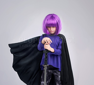 Buy stock photo Superhero, children and fantasy with a girl in studio on a gray background for vigilante crime fighting. Warrior, kids or sword with a female child in a cosplay mask and cape as a super hero