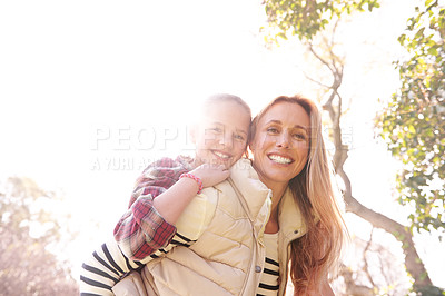 Buy stock photo Love, portrait and mother and child piggyback in a park, bond and having fun outdoor. Happy, face and parent with girl in nature hug, smile and enjoying vacation, weekend or holiday in a forest