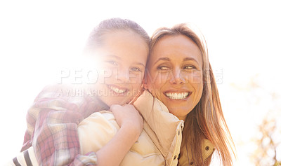 Buy stock photo Portrait, love and piggyback by girl and mother outdoors for bonding, free and having fun in nature. Happy, face and child with parent in a park, hug and sharing cute family moment while walking