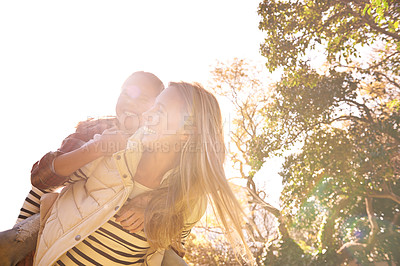 Buy stock photo Love, piggyback and mother with girl child in a park happy, hug and bonding outdoor together. Smile, parent and family embrace in nature, laughing and having fun while walking and enjoying a holiday