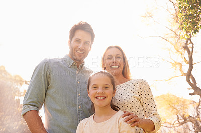 Buy stock photo Nature, sunshine and happy portrait of family, parents and child support, bonding and enjoy outdoor quality time together. Sky, spring flare and happiness of mother, father or kid smile for love care