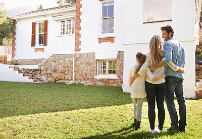 Buy stock photo New house, love or happy family hug for real estate, property or dream home purchase, sale or investment. Mortgage, people moving or back of outdoor parents, child or homeowner embrace for relocation