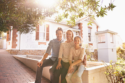 Buy stock photo A portrait of a happy family sitting outside of their home