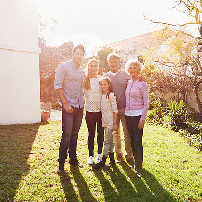 Buy stock photo Hug, outdoor portrait and happy family grandparents, parents and child bonding, smile and together in backyard lawn. Happiness, solidarity and reunion people enjoy summer sunshine, love and support