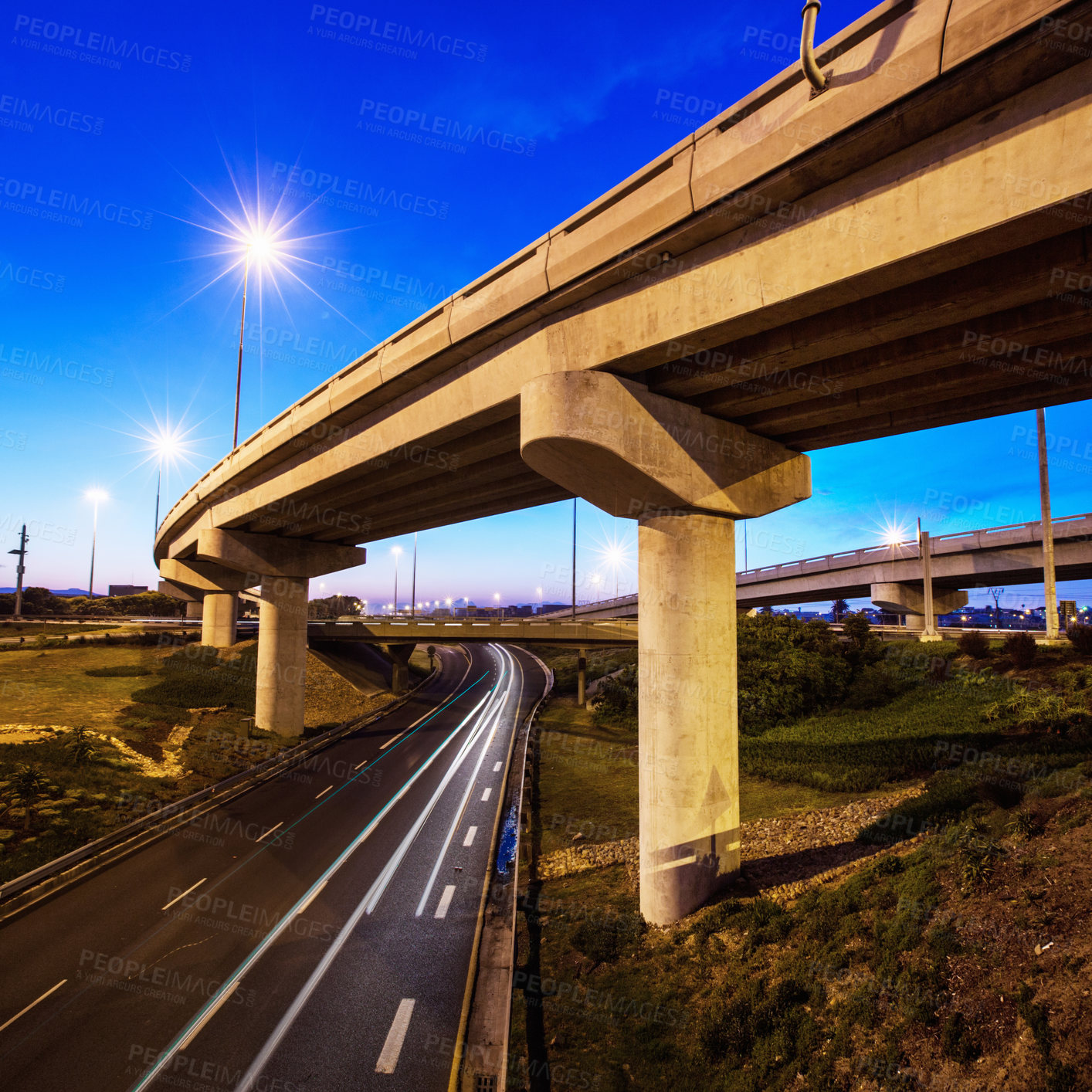 Buy stock photo A cropped shot of a concrete overpass on a stretch of road