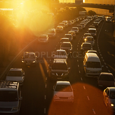 Buy stock photo Traffic jam, sunset and highway with cars in road for transportation, rush hour and travel. Journey, automobile and driving with vehicles in urban city for morning commute, moving and busy street