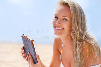 Buy stock photo Woman, tablet and beach and holiday portrait, female person and smile outdoor or technology for entertainment. Browsing, social media or stream online on vacation, happy or calm on Miami summer trip