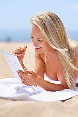 Buy stock photo Woman, tablet and ocean holiday to relax, female person and smile outdoor with technology for entertainment. Browsing, social media or streaming online on vacation, happy or calm on Miami summer trip