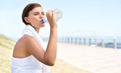 Buy stock photo Woman, drink water and outdoor at beach for health, fresh air and fitness in nature, h2o and sea. Nutrition, detox and mineral liquid for thirst, hydration and exercise with beverage for wellness 
