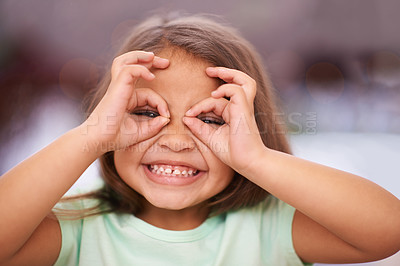 Buy stock photo Portrait, girl and child with hands on eyes for playful or silly facial expression, funny and happiness. Female kid, adorable with gesture on face for vision or glasses, youth and childhood with fun.