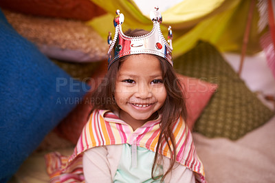 Buy stock photo A cute little girl dressed up as a princess while playing at home