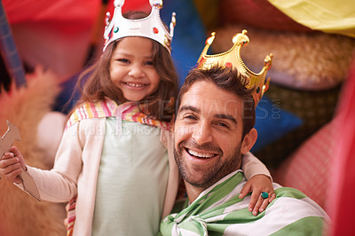 Buy stock photo King, play or dad with princess in a portrait, home fort or family castle with crown costume or fun parent. Hug, happiness or smile with father, joy and an excited child for a dress up or sword game