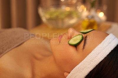 Buy stock photo Spa, relax and woman with cucumber on face for skincare massage, peace or wellness. Facial, salon and person with vegetable on eyes in therapy for natural beauty or healthy organic treatment closeup