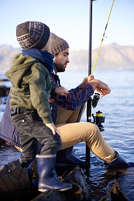 Buy stock photo Outdoor, man and father with pole for fish to catch with son in nature, water and pond for bonding. Parent, male person and dad with kid for adventure in city of Cape Town for vacation and holiday