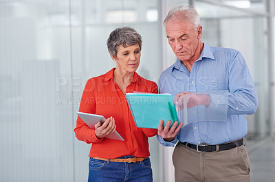 Buy stock photo Documents, team or mature business people in discussion, planning or brainstorming strategy in office mockup. Ceo, man and serious woman in collaboration with tablet for project of financial advisors