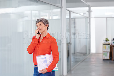Buy stock photo Mature, businesswoman and paperwork in office on smartphone, network technology for communication. Career development, negotiation on phone call and conversation, statistics work and female person