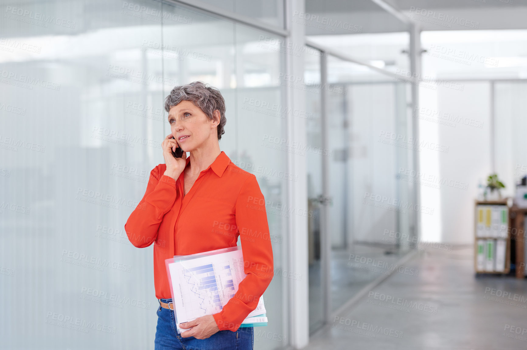 Buy stock photo Mature, businesswoman and paperwork in office on smartphone, graphs on document and communication. Career development, negotiation on phone call and conversation and auditor with statistics work 