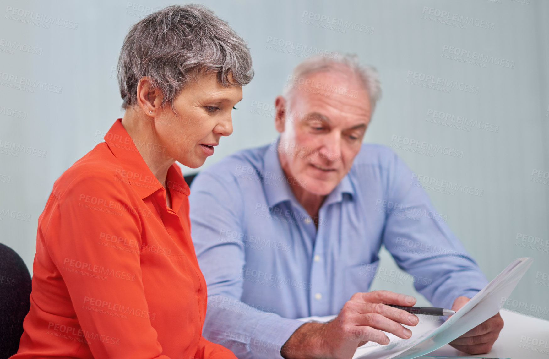 Buy stock photo Documents, planning and senior woman with financial advisor in discussion for pension fund in office. Conversation, paperwork and elderly female person with finance consultant for retirement savings.