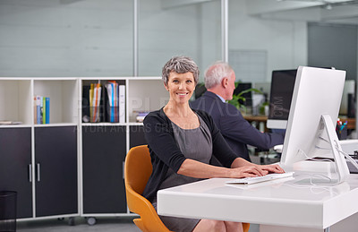 Buy stock photo Business, mature and portrait of woman typing on pc in office with male colleague, senior management or supervisor for corporate company. Person, technology and online for performance monitoring