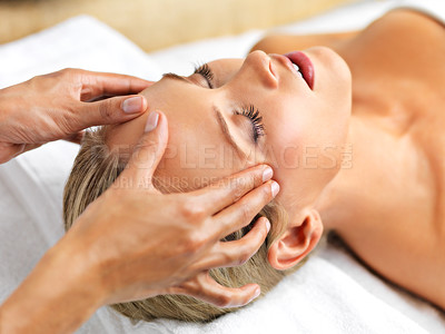 Buy stock photo A beautiful young woman relaxing in a spa