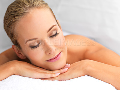Buy stock photo Woman, massage and spa for peace and treatment, destress and wellness with physical therapy at luxury resort. Serene, zen and calm with stress relief, self care with service and holistic healing