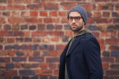 Buy stock photo Man, portrait and urban fashion by brick wall downtown for aesthetic, modern and vacation for city culture. Male person, trendy winter clothes for streetwear style for creative career in New York