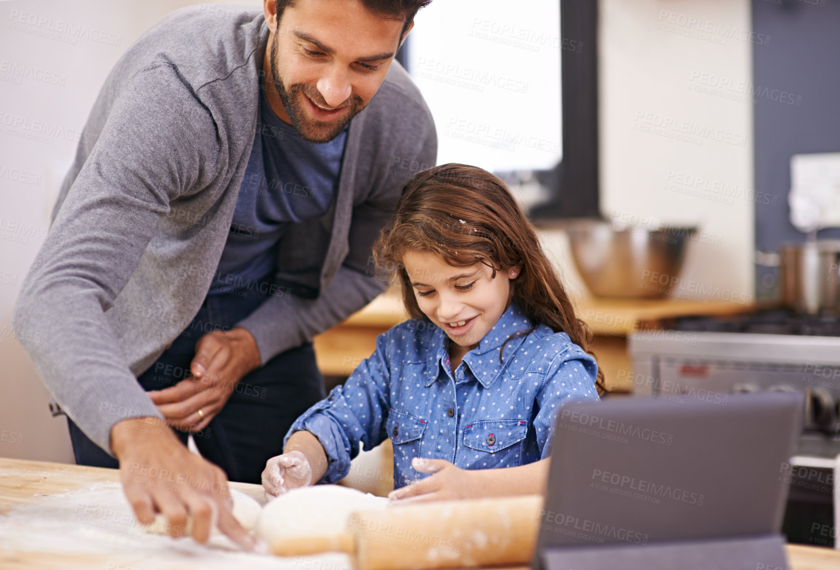 Buy stock photo Pizza, dough and father with child in kitchen and tablet with recipe, guide and learning from online tutorial. Cooking, together and girl help with rolling pin and baking with dad in home for dinner