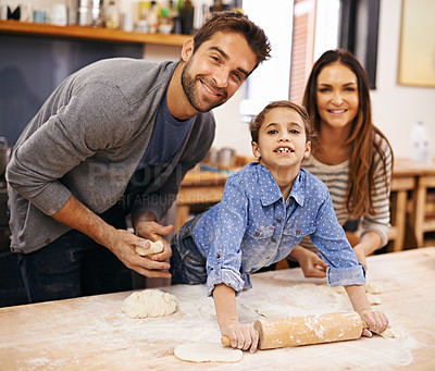 Buy stock photo Happy, family and portrait with child in kitchen, marriage couple and female person baking in home. Father, mama helping make dough with flour on counter, parents or smile with people cook together