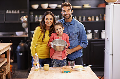 Buy stock photo Parents, kid and portrait for baking with love, ingredients for cake or dessert with support and handmade with care. Mom, dad and girl child together in kitchen for bonding or teaching with affection