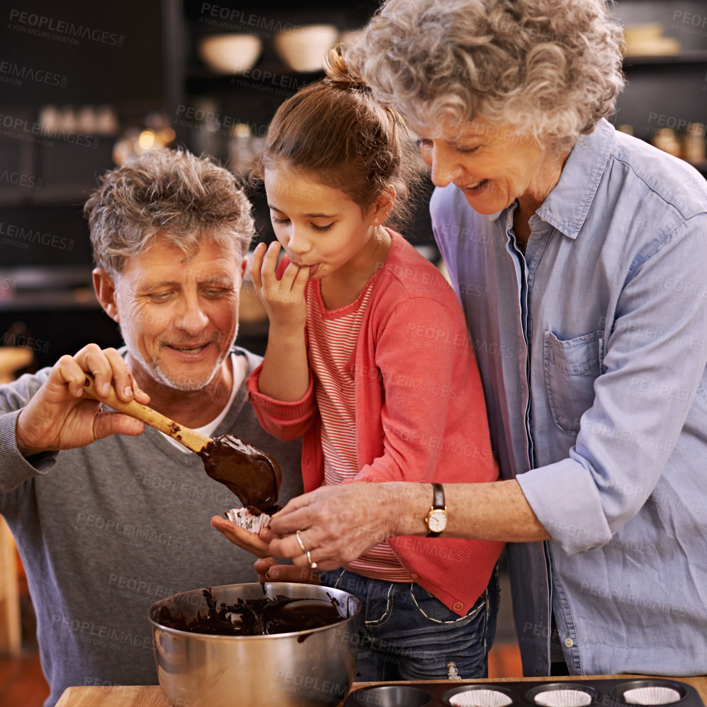 Buy stock photo Teaching, baking and grandparents with girl, smile and ingredients with help and bonding together. Family, senior man or old woman with grandchild, happy or utensils with recipe or hobby in a kitchen