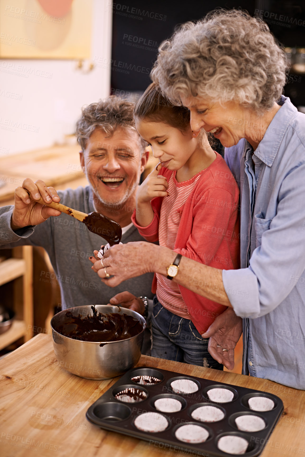 Buy stock photo Help, grandparents and baking with girl, home and hobby with happiness and bonding together with recipe. Family, grandchild and senior man with old woman and activity with utensils, food and teaching