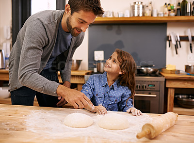 Buy stock photo Father, kitchen and happy child baking, helping and dough with flour on counter table, parent together and smile. Family home, cooking activity and fun bonding for meal preparation with utensil