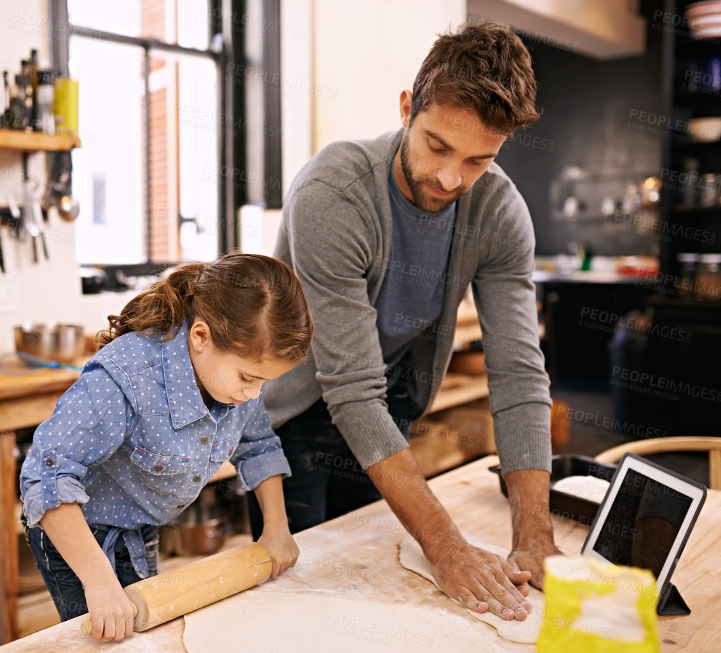 Buy stock photo Pizza, dough and father with child in kitchen and tablet with recipe, guide and learning from online tutorial. Cooking, together and girl help with rolling pin and baking with dad in home for dinner